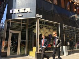 People walk past an IKEA kitchen showroom downtown Stockholm