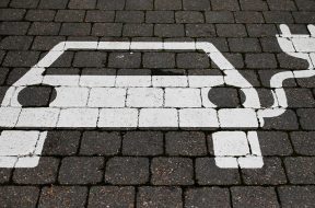 FILE PHOTO: A parking sign for electric vehicles is pictured in Gruenheide