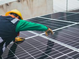 solar-technician-installing-solar-panel-stockpack-pexels-scaled_Rooftop_Solar