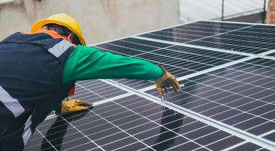 solar-technician-installing-solar-panel-stockpack-pexels-scaled_Rooftop_Solar